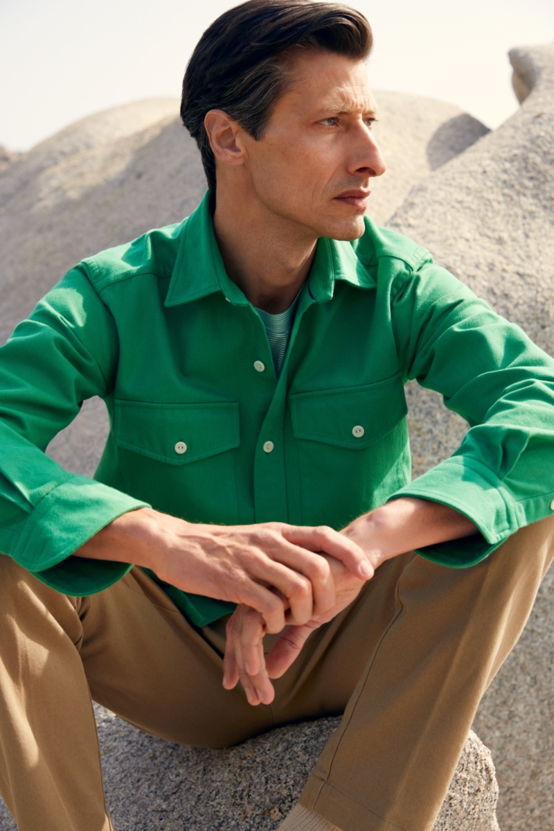 Standing out in a green overshirt, Jonas Mason fronts Eton's spring-summer 2023 campaign. 