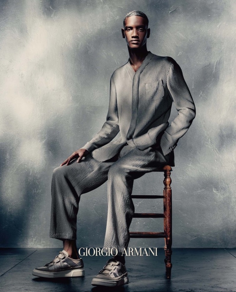 Ibrahim Idoow sits for a portrait as the star of Giorgio Armani's spring-summer 2023 campaign for men. 