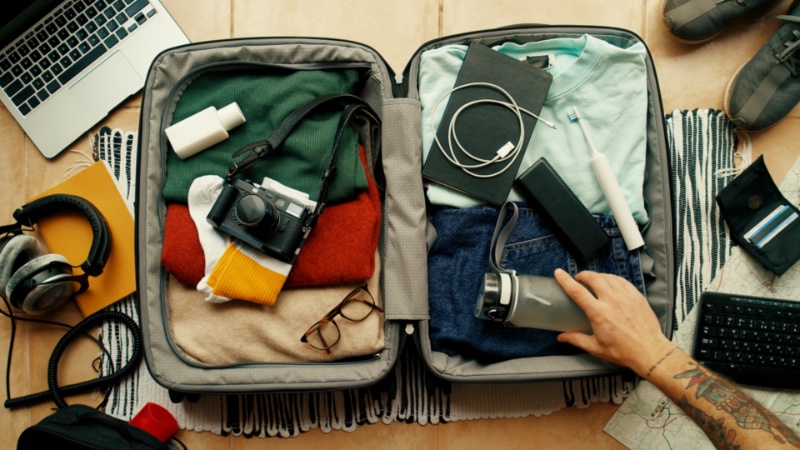 Man Packing for Travel Medical Tourism Man Packing for Travel Medical Tourism