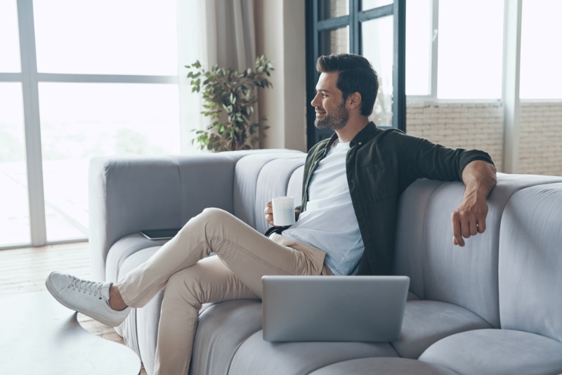 Man Relaxing on Couch Man Relaxing on Couch