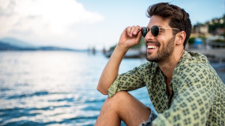 Man Smiling by Sea