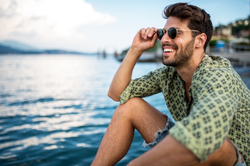 Man Smiling by Sea