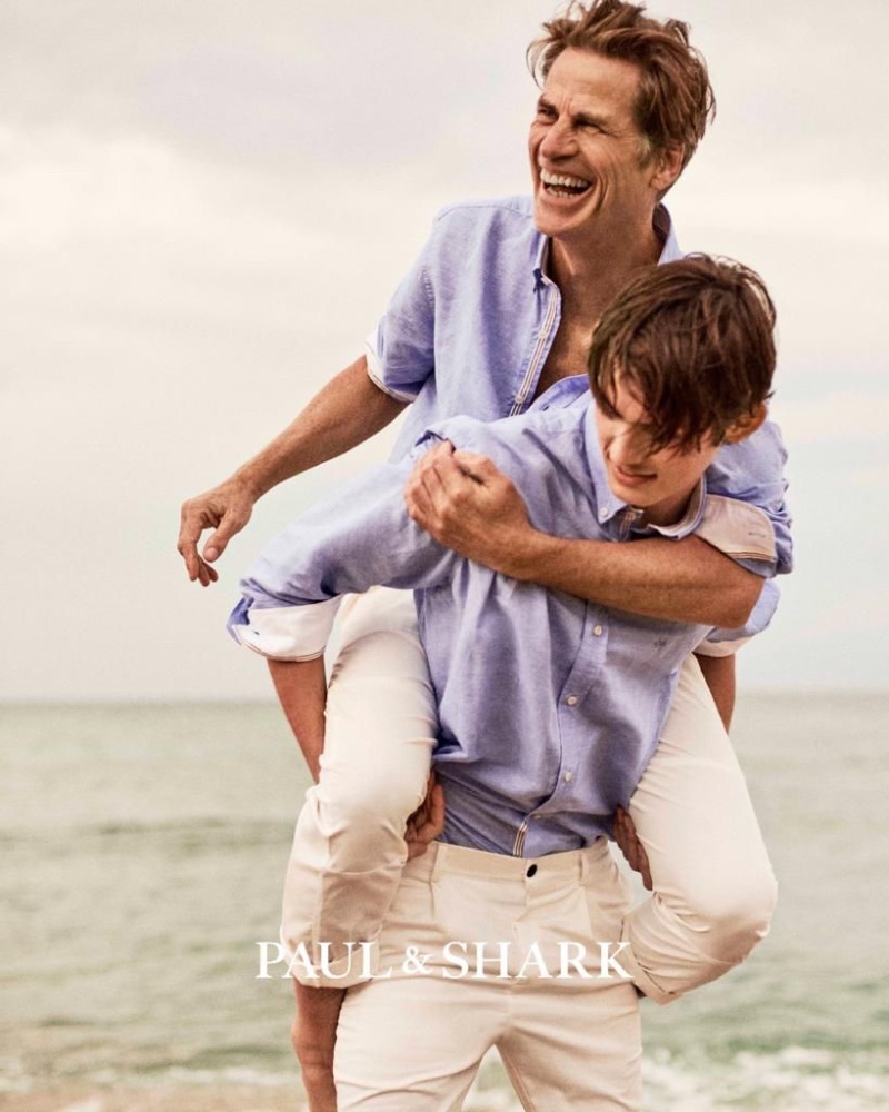 All smiles, Mark Vanderloo and Mark Vanderloo Jr. hit the beach for Paul & Shark's spring-summer 2023 campaign.