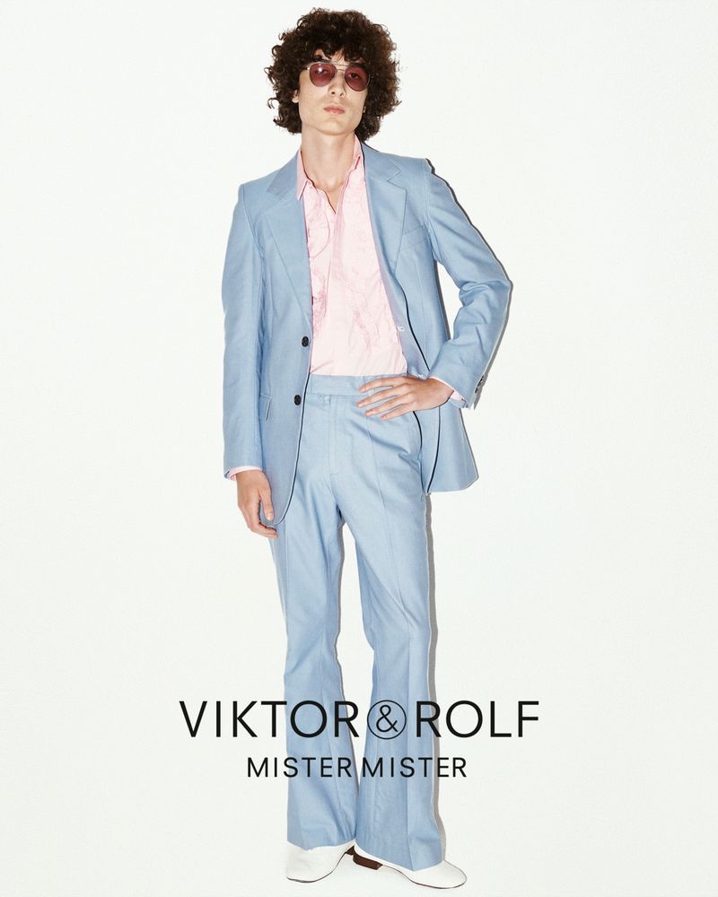 Paul-Emile Paillier wears a light blue denim suit from the Viktor & Rolf Mister Mister spring-summer 2023 collection.