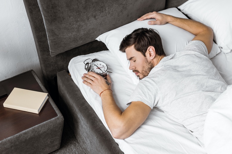 Guy Sleeping Alarm Clock Bed