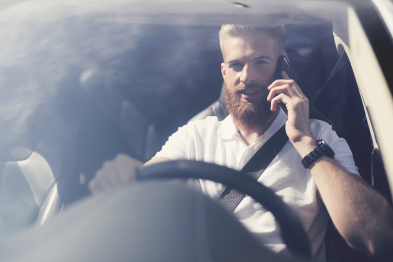 Man Driving Car Wearing Watch