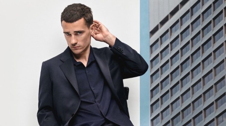 Antoine Griezmann wears a slim-fit virgin wool suit for Mango's spring-summer 2023 campaign.