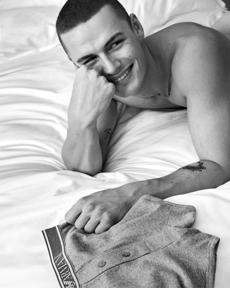 All smiles, Finley Prentice appears in Emporio Armani's spring-summer 2023 underwear campaign. 