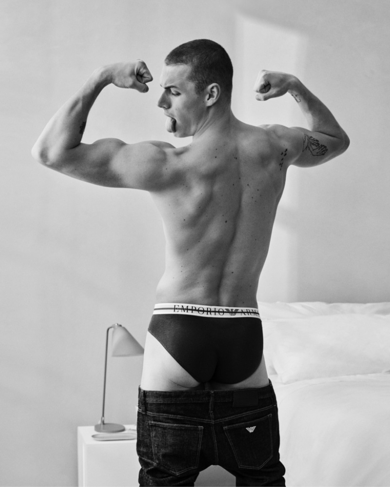 Flexing, model Finley Prentice stars in Emporio Armani's spring-summer 2023 underwear campaign. 