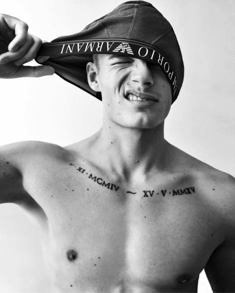 Finley Prentice fronts Emporio Armani's spring-summer 2023 underwear campaign. 