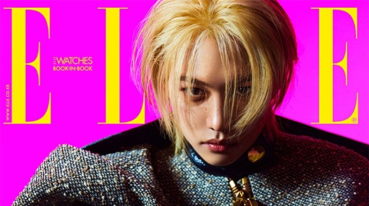 Making a sartorial statement for the May 2023 cover of Elle Korea, Felix dons a tweed Louis Vuitton jacket.