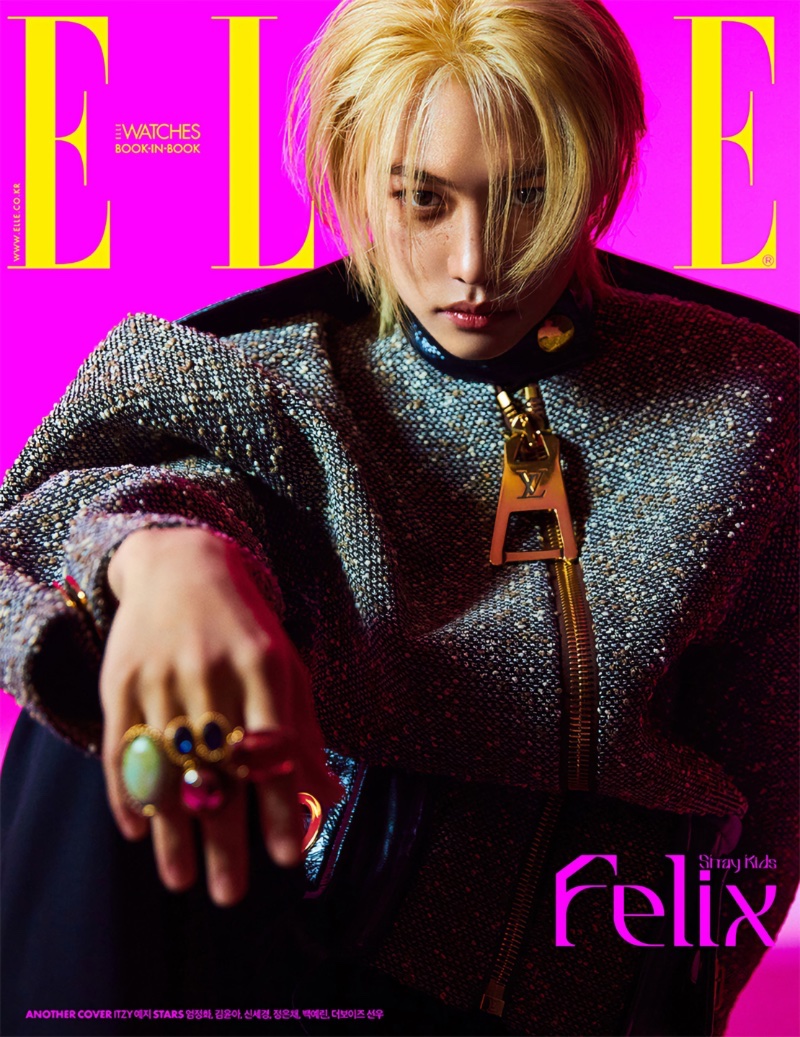 Making a sartorial statement for the May 2023 cover of Elle Korea, Felix dons a tweed Louis Vuitton jacket.