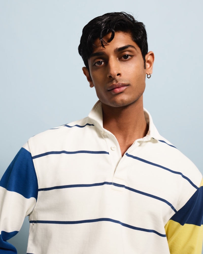 Pratik Shetty sports a rugby polo for J.Crew's summer 2023 campaign.