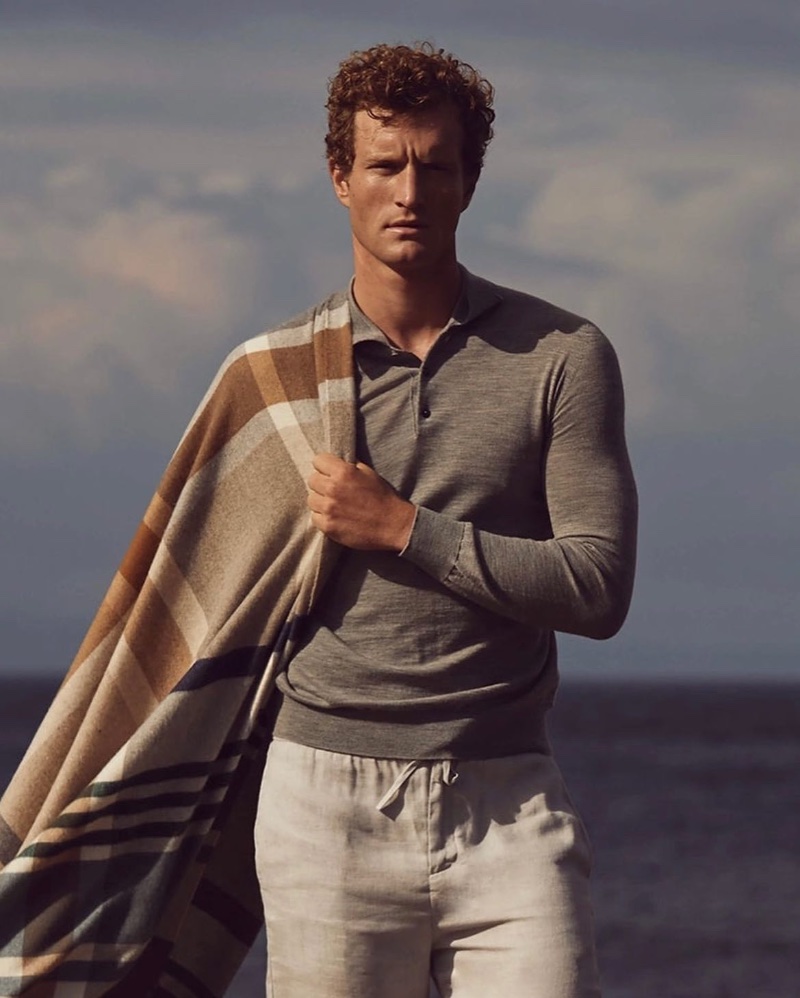 In front and center, Bas Tijhof models a Johnstons of Elgin merino wool long-sleeve polo.