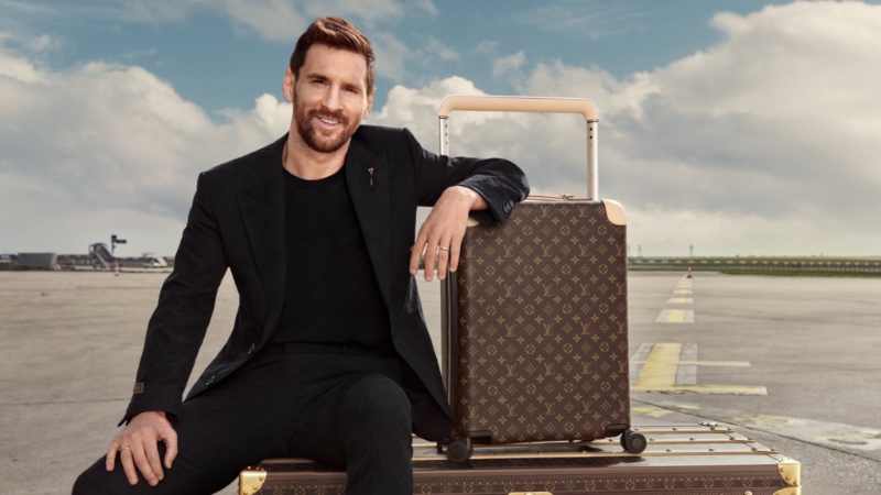 Lionel Messi Models Chelsea Boots in Louis Vuitton Travel