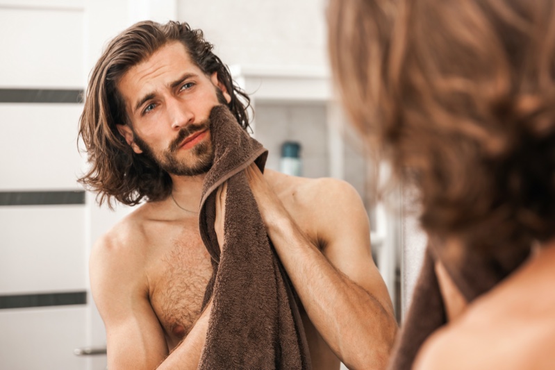 Man Grooming Long Hair