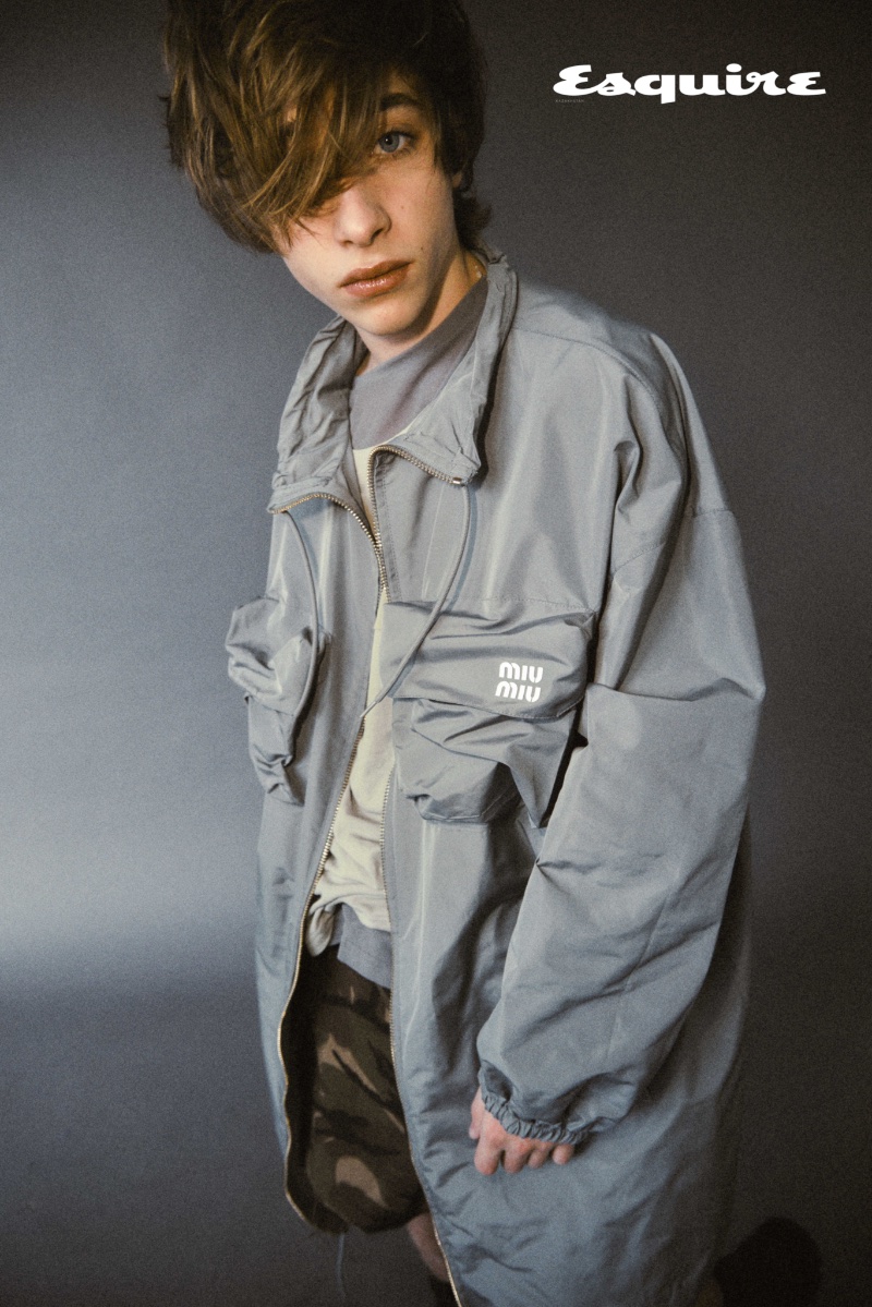 Wearing a sporty look, Raphael Luce slips into a Miu Miu parka with camouflage shorts by Celine Homme. » Raphael Luce Brings His Fashion A-Game for Esquire Kazakhstan Wearing a sporty look, Raphael Luce slips into a Miu Miu parka with camouflage shorts by Celine Homme.