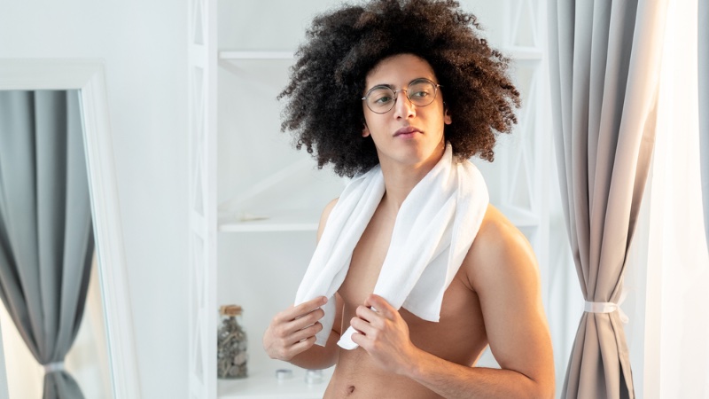 Shirtless Man Curly Hair Glasses Towel