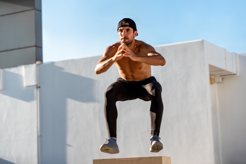 Shirtless Man Working Out Backward Cap