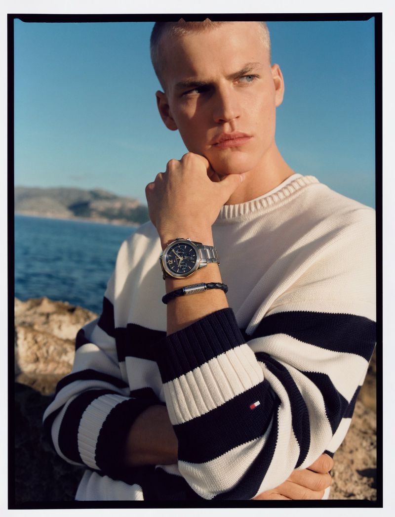 Timo Pan wears a watch and bracelet for Tommy Hilfiger's spring-summer 2023 accessories campaign. 