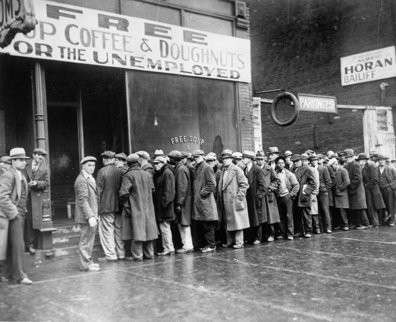 Men queue outside a 1931 depression soup kitchen opened by Al Capone in Chicago.