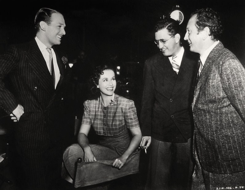 Douglas Fairbanks Jr., Paulette Goddard, David O. Selznick, and Richard Wallace on the 1938 set of The Young in Heart.