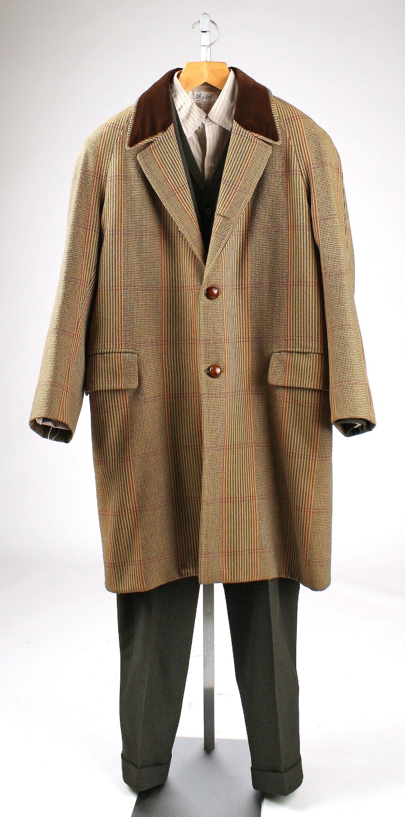A 1950s men's outfit, consisting of wool, silk, cotton, and leather.
