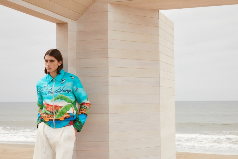 German model Maxim Emanuel dons a graphic jacket for AMIRI's pre-fall 2023 campaign. » AMIRI Pre-Fall 2023: Sport-Inspired Luxury German model Maxim Emanuel dons a graphic jacket for AMIRI's pre-fall 2023 campaign.
