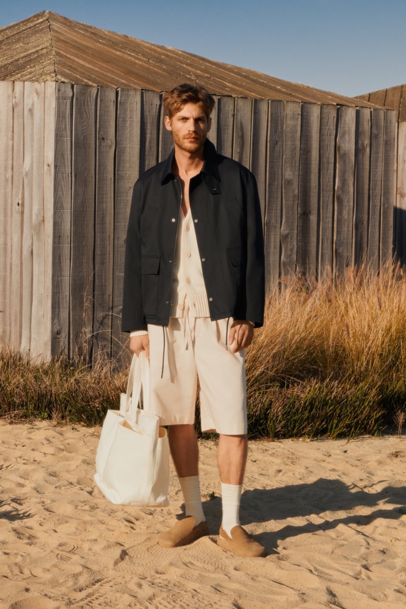 In front and center, Baptiste Radufe dons Zara's black and white fashions. 
