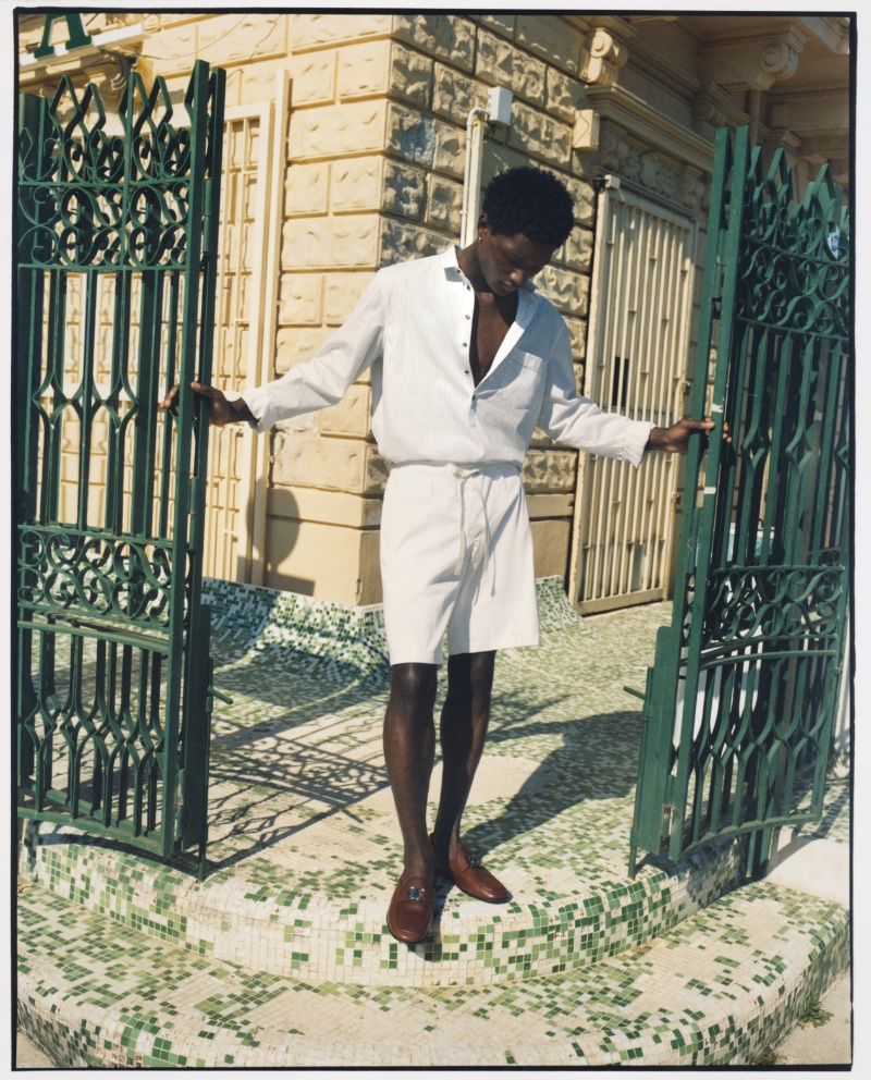 A summer vision in white, Bah Aziz sports an outfit from the Dolce & Gabbana x Mytheresa capsule collection.