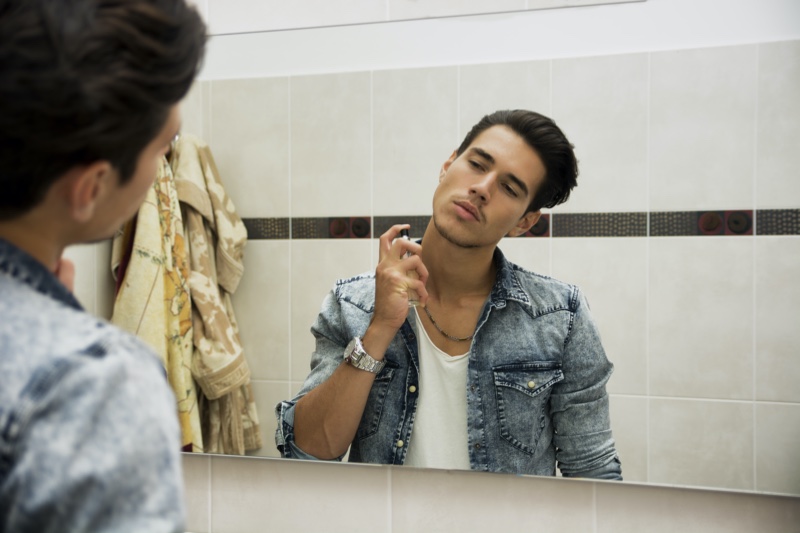 Guy Spraying Cologne » Seductive Scents: Unveiling the Allure of Men's Cologne Guy Spraying Cologne