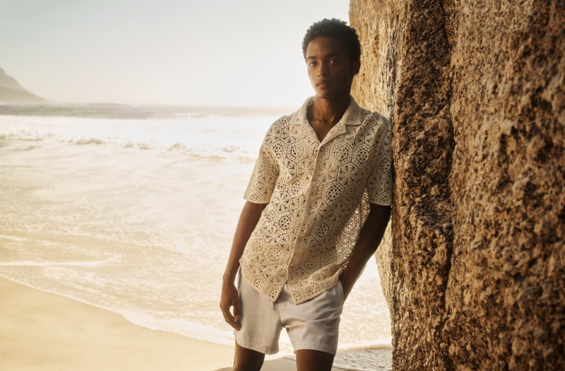 Stan Taylor models a regular-fit crochet-look resort shirt with regular-fit lyocell shorts.