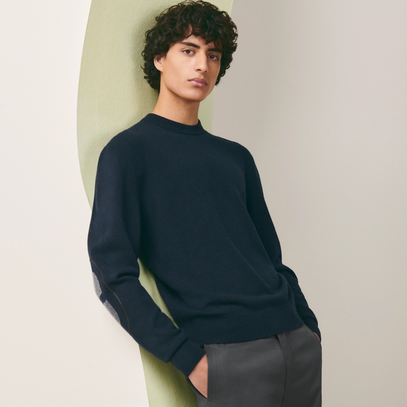 Regularly noted for its reflection of quiet luxury, Hermès is the epitome of casual elegance with its Maillon Chaine D'ancre cashmere sweater.