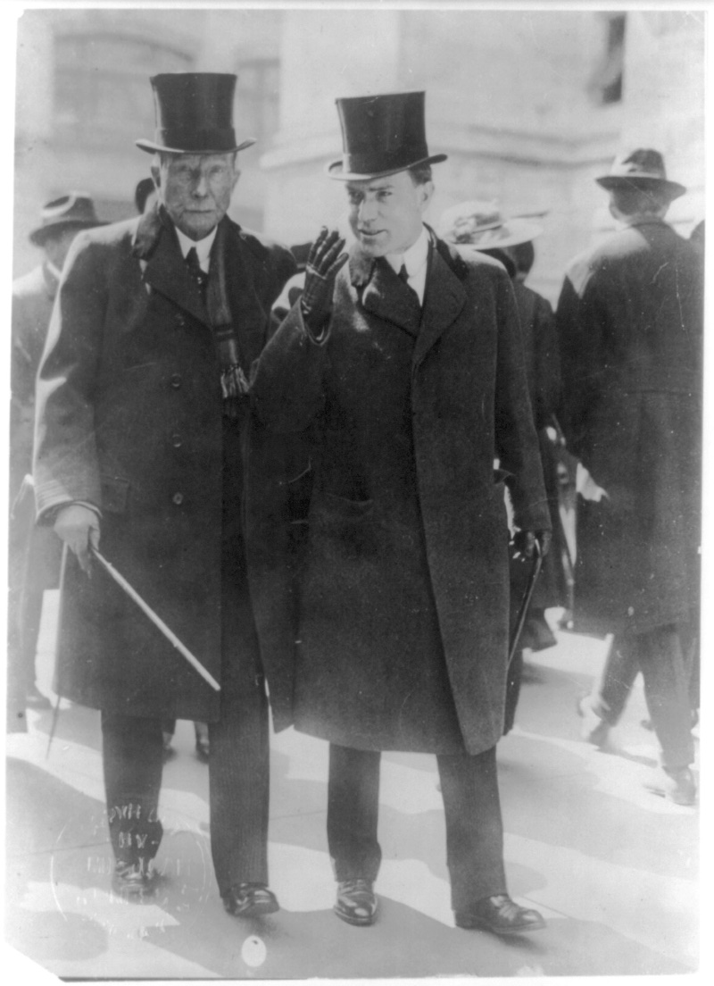 John D. Rockefeller pictured out and about with his son John D. Rockefeller Jr. in 1915.