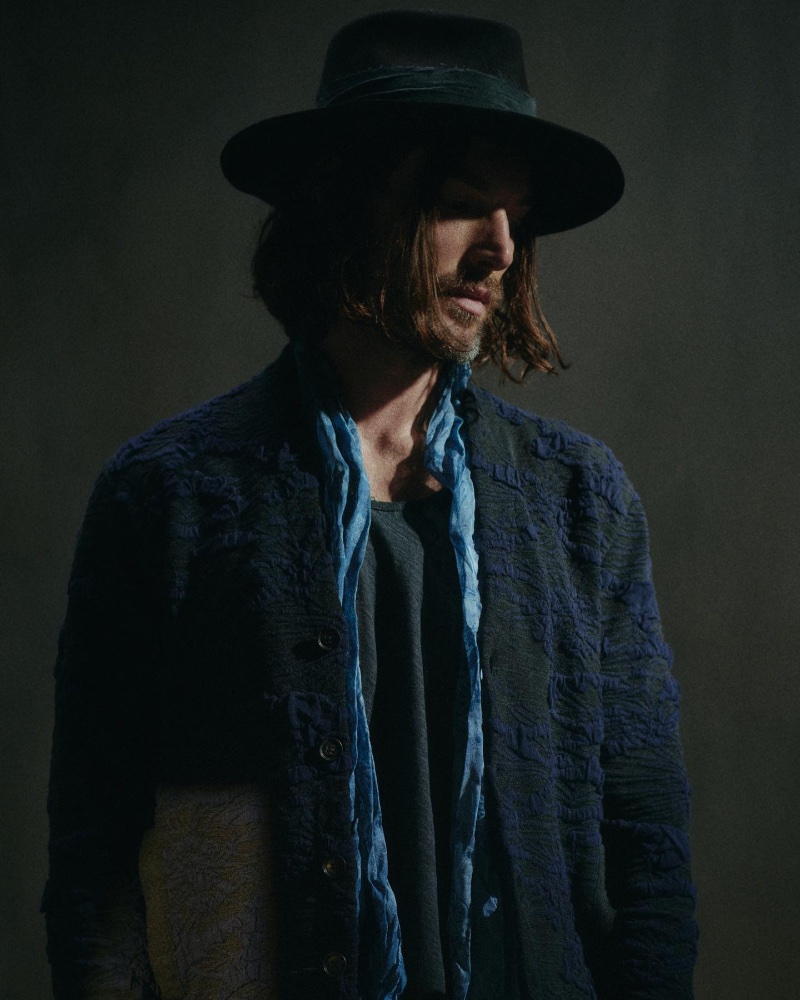 Making a style statement, Charlie Wilson sports John Varvatos' Motley cardigan that features a textural floral jacquard. 