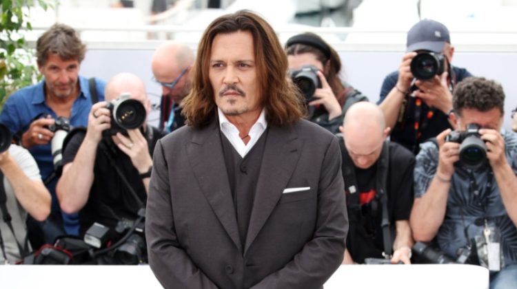 Johnny Depp wears Dior Men to the Jeanne du Barry photocall at the 76th annual Cannes film festival on May 17, 2023.