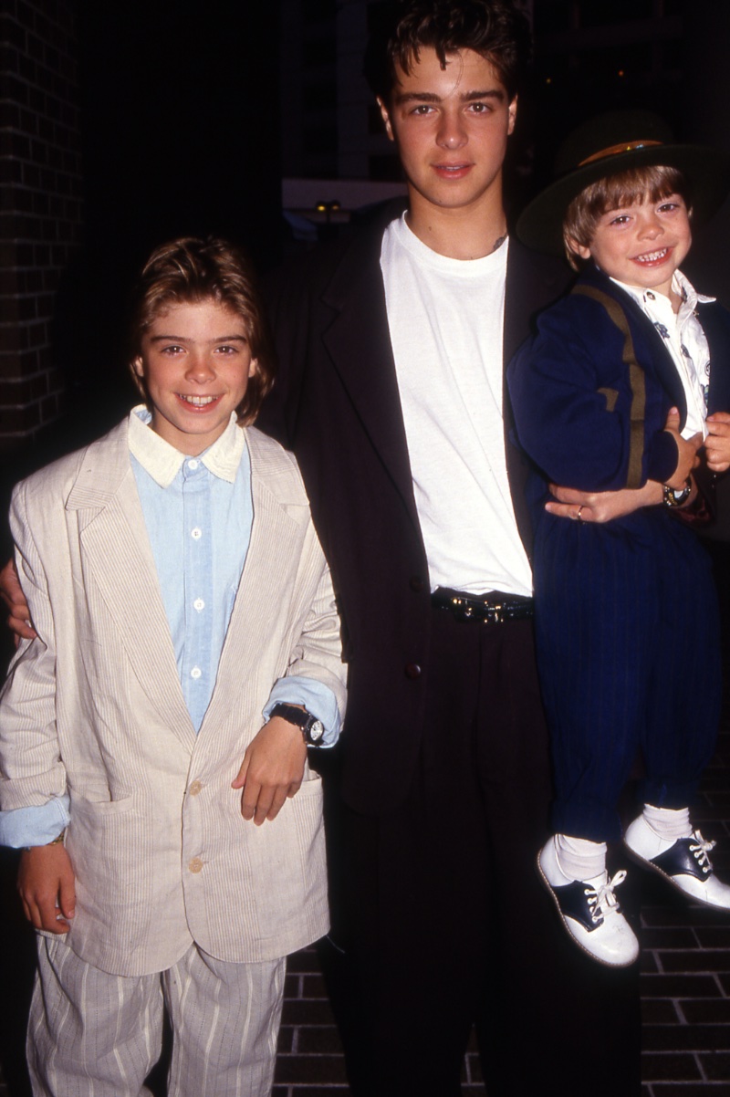 The Lawrence Brothers; Matthew, Joey, and Andy clean up in oversized suiting, circa 1990. 