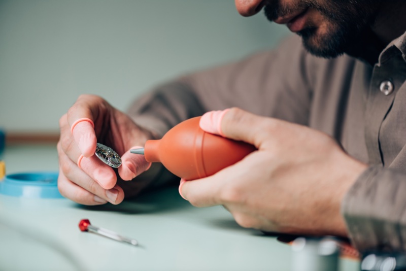 Man Cleaning Watch Man Cleaning Watch
