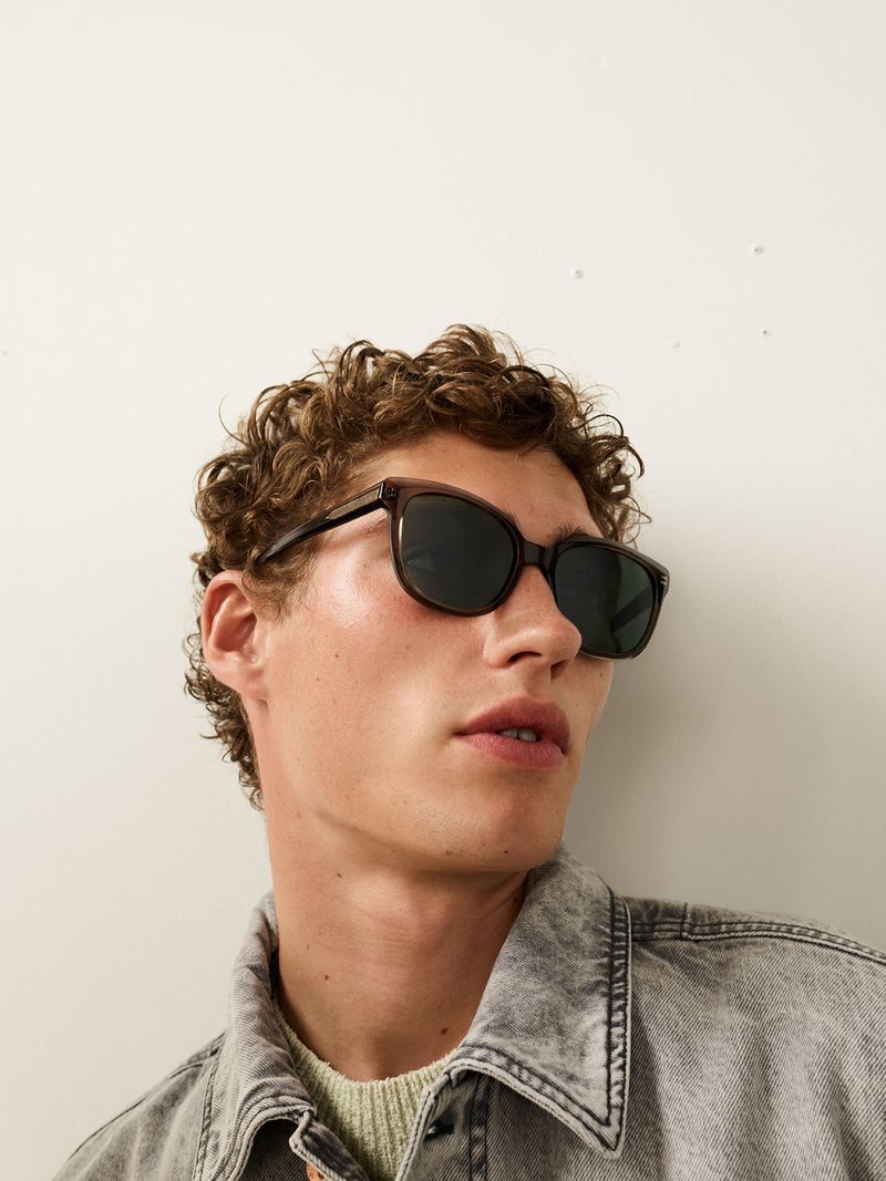 Valentin Humbroich rocks shades and a denim jacket by Marc O'Polo. 