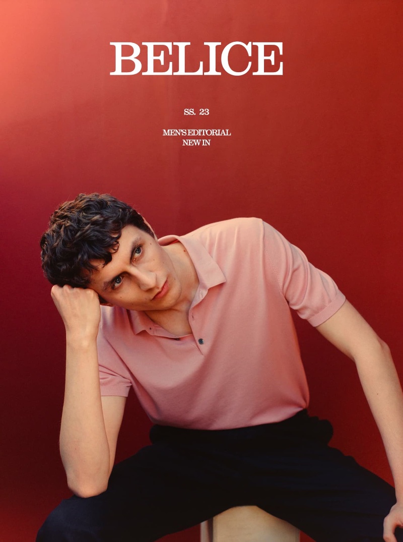 Henry Kitcher models a pastel pink Massimo Dutti polo sweater. » Tropical Elegance: Massimo Dutti's Belize-Inspired Wardrobe Henry Kitcher models a pastel pink Massimo Dutti polo sweater.