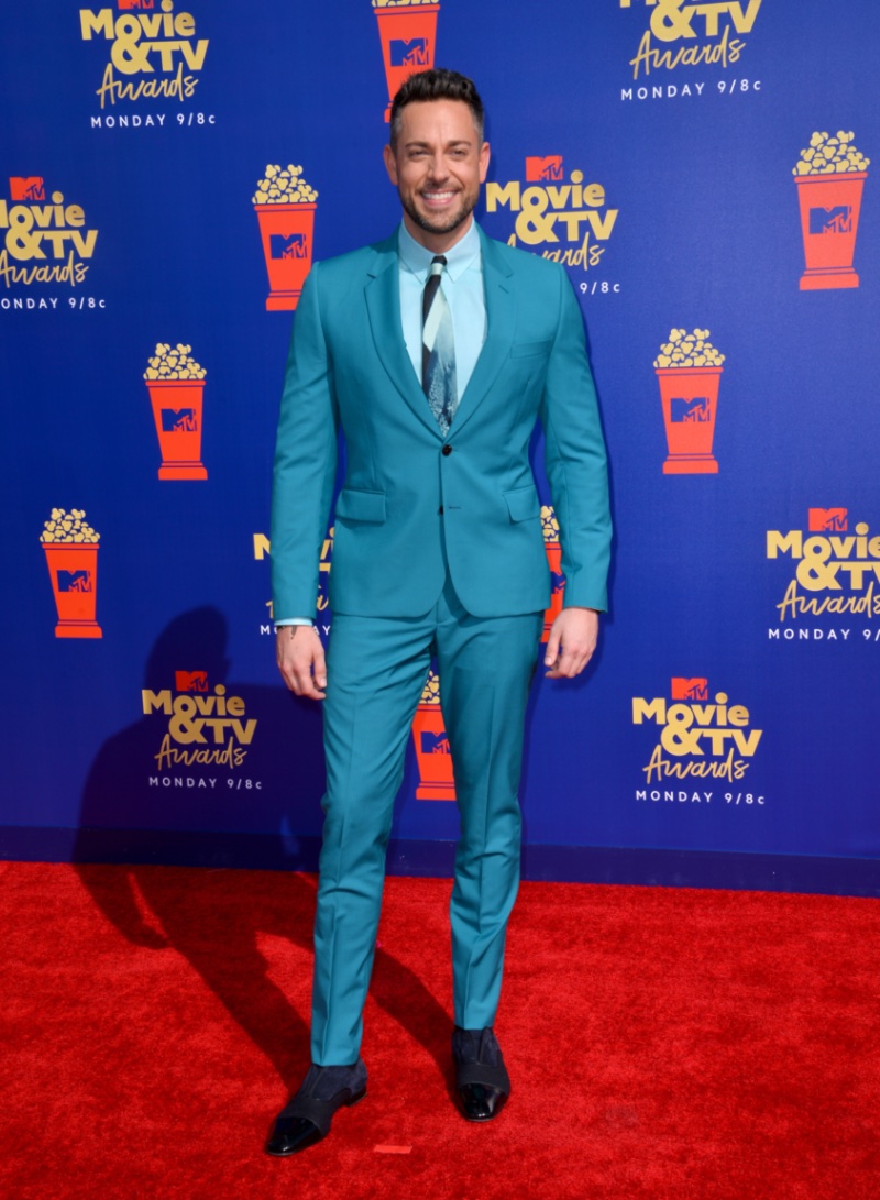 Zachary Levi makes a teal statement in a monochromatic suit number at the MTV Movie & TV Awards. 