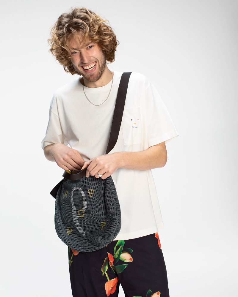 Pascal Moelaert sports a logo pocket t-shirt and tulip print nylon trousers from the Paul Smith + Pop Trading Company capsule collection. » Paul Smith & Pop Trading Company Redefine Skate Fashion Pascal Moelaert sports a logo pocket t-shirt and tulip print nylon trousers from the Paul Smith + Pop Trading Company capsule collection.