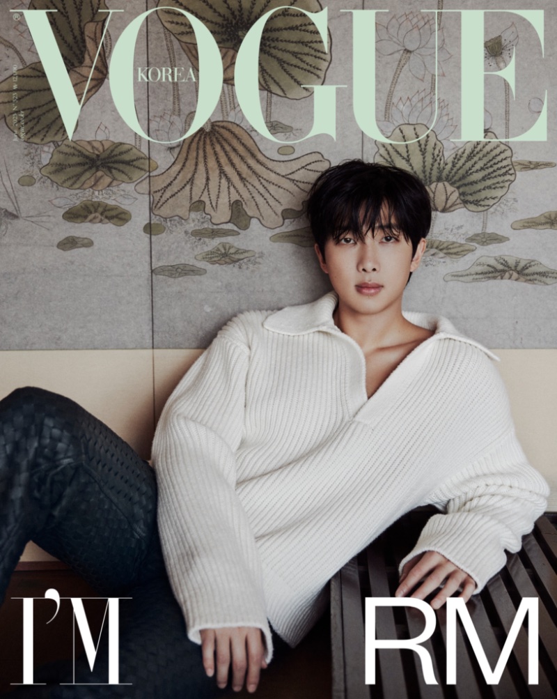 RM covers Vogue Korea, wearing a Bottega Veneta v-neck polo sweater with leather trousers. 