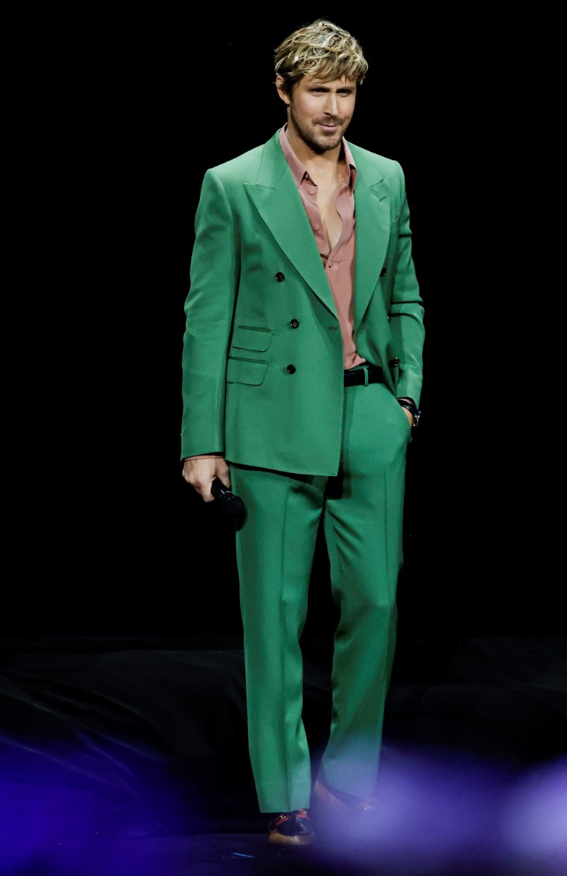 Actor Ryan Gosling makes a bold statement in a green suit and pastel pink shirt at a Universal Pictures and Focus Features special presentation at The Colosseum during CinemaCon. » Ryan Gosling Channels His Inner Ken, Makes a Splash in Gucci Actor Ryan Gosling makes a bold statement in a green suit and pastel pink shirt at a Universal Pictures and Focus Features special presentation at The Colosseum during CinemaCon.
