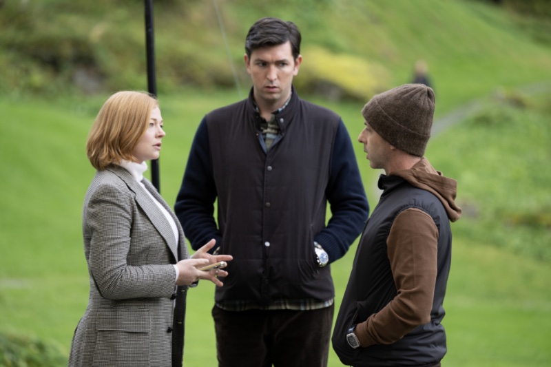Sarah Snook, Nicholas Braun, and Jeremy Strong appear in a Succession scene. Braun dons an IWC watch.
