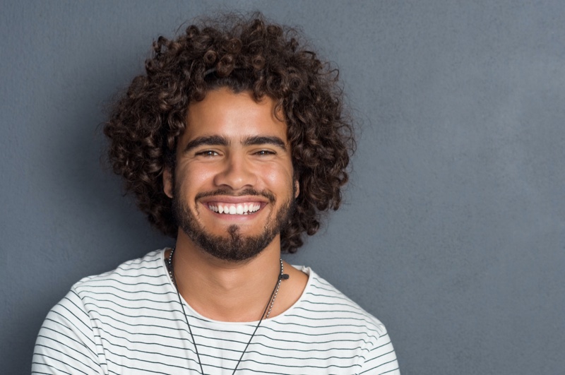 Smiling Man Curly Hair