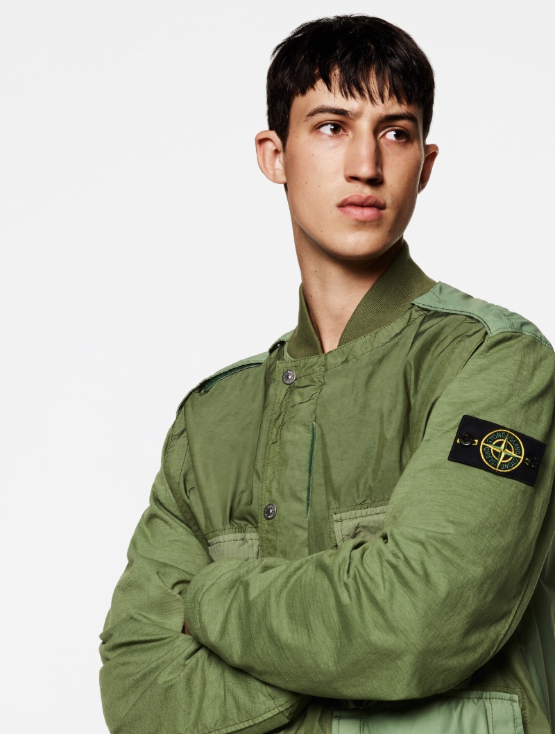 Fausto Sylvester wears a blouson jacket from Stone Island's spring-summer 2023 Mix Fabric Hype-TC collection.