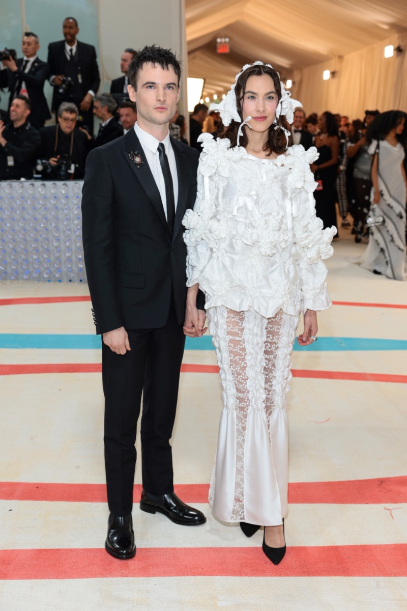Tom Sturridge wears Dior Men to the 2023 Met Gala, posing alongside his girlfriend Alexa Chung.