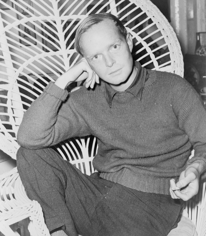 Truman Capote wears a wool sweater.
