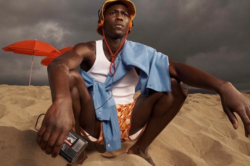 Cheikh Dia models a bucket hat and swim shorts from the new Zara x Standard Procedure collection.
